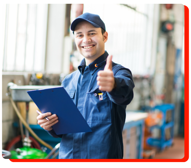 "Smiling auto technician giving a thumbs up at Venus Auto Performance in Etobicoke"